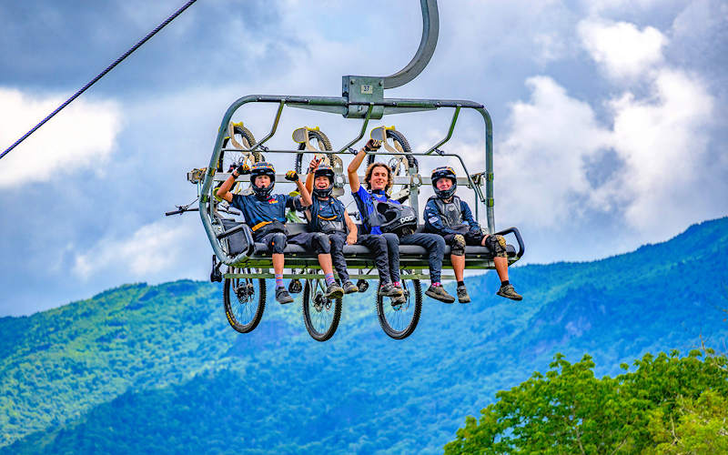 Bikers on Lift, Sugar Mountain